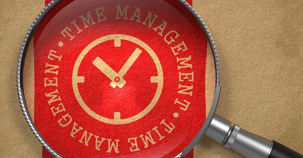 Magnifying Glass with Time Management Written Arround Icon of Clock Face on Old Paper with Red Vertical Line Background_ Business Concept_-1